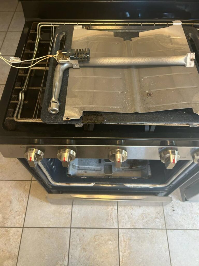 We safely removed the damaged igniter and replaced it with a new, high-quality part.